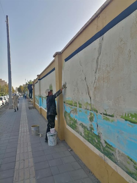 اجرای نقاشی دیواری در خیابان ارتش